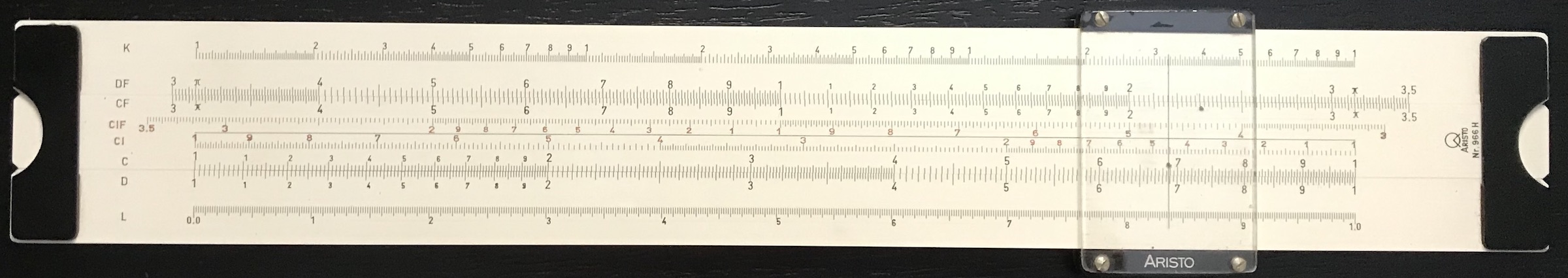An Aristo slide rule that includes CI, CIF, DF, and CF scales. Note, also, the L scale (log) along the bottom.